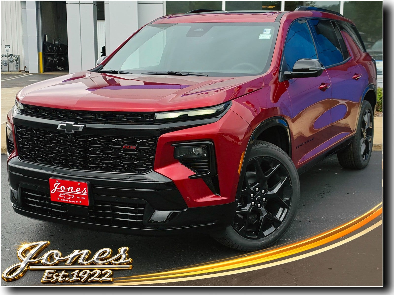 2026 Chevrolet Traverse RS in Radiant Red Tintcoat — front three-quarter view