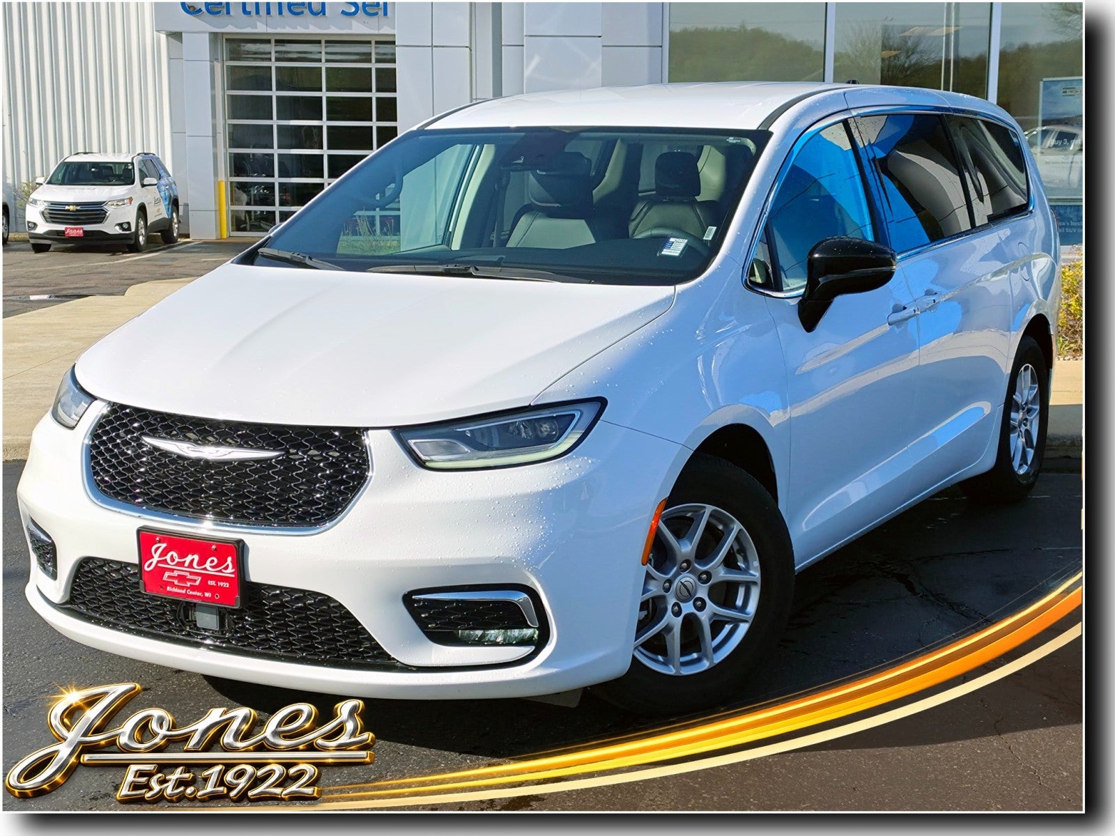 2024 Chrysler Pacifica Touring L in Bright White — front three-quarter view